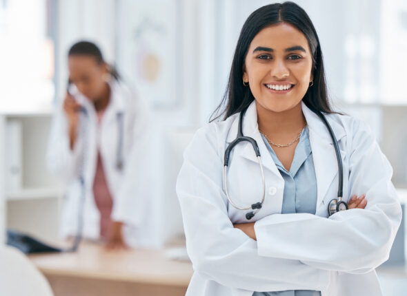 indian-woman-doctor-and-arms-crossed-in-hospital-2025-04-06-10-45-30-utc